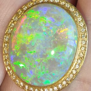 $32,000 IMG2940 - Mintubi Super Gem Large Oval Opal 31.3cts set in 18ct YG with 46 diamonds 29x25mm