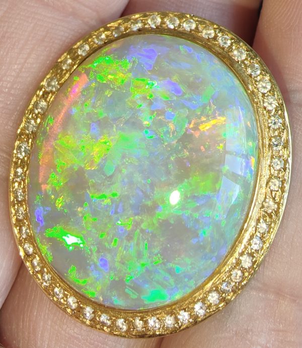 $32,000 IMG2940 - Mintubi Super Gem Large Oval Opal 31.3cts set in 18ct YG with 46 diamonds 29x25mm