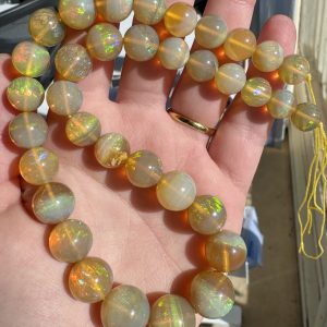 $15750 IMG3460-74 - Lambina Amber Super gem opal 10-15mm 315cts.1
