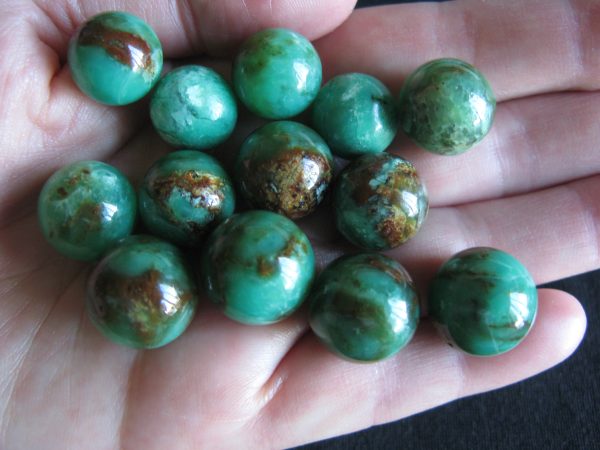 $36-42 each IMG6094 - Chrysoprase Spheres Brilliant Brown markings 5 x 14mm round 18.4cts to 3 x 16mm round 29.6cts 8 remaining 14mm $36 each / 16mm $42 each
