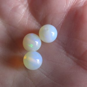 $178 IMG0743 - Andamooka 7mm round (3) $35/ct 5.1cts