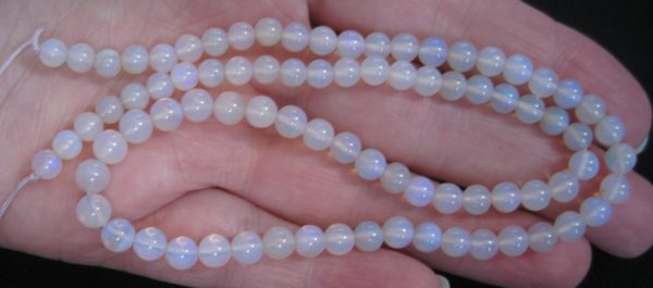$300 IMG0806 - Andamooka Blues 5mm Round 57cts