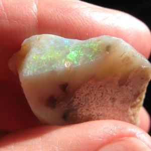 $975 IMG7776 - Mintubi Super Gem Dark Base Brilliant Reds Golds a little Green .225oz