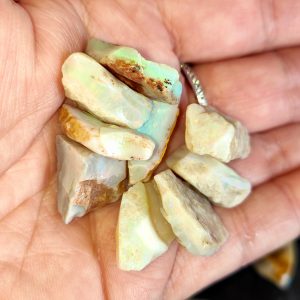 Mintubi White Base some Reds, Greens and Blues 2oz 25 Stones $300/oz