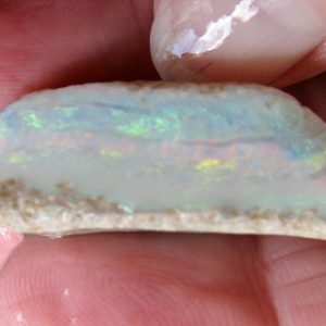 Mintubi Reds and Greens Gem 37x12x12.75mm can cut 2 or 3 stones $112/g 7.54g