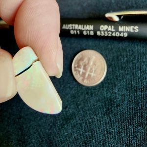Mintubi on Sandstone Greens and Reds - Broken into 2 pieces 7cts total