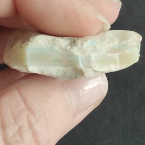 Mintubi on Sandstone Reds, Greens and Blues sitting deep within .749oz $250/oz