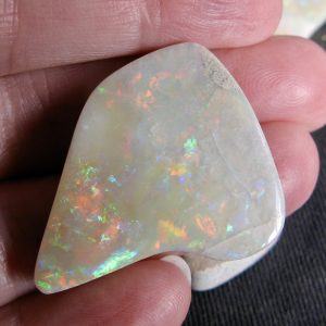 Mintubi on Sandstone Bright Blues, Reds and Greens One end Crazed $18/ct 33.1cts